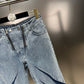 Jeans svasati con doppia zip e inserto con freccette